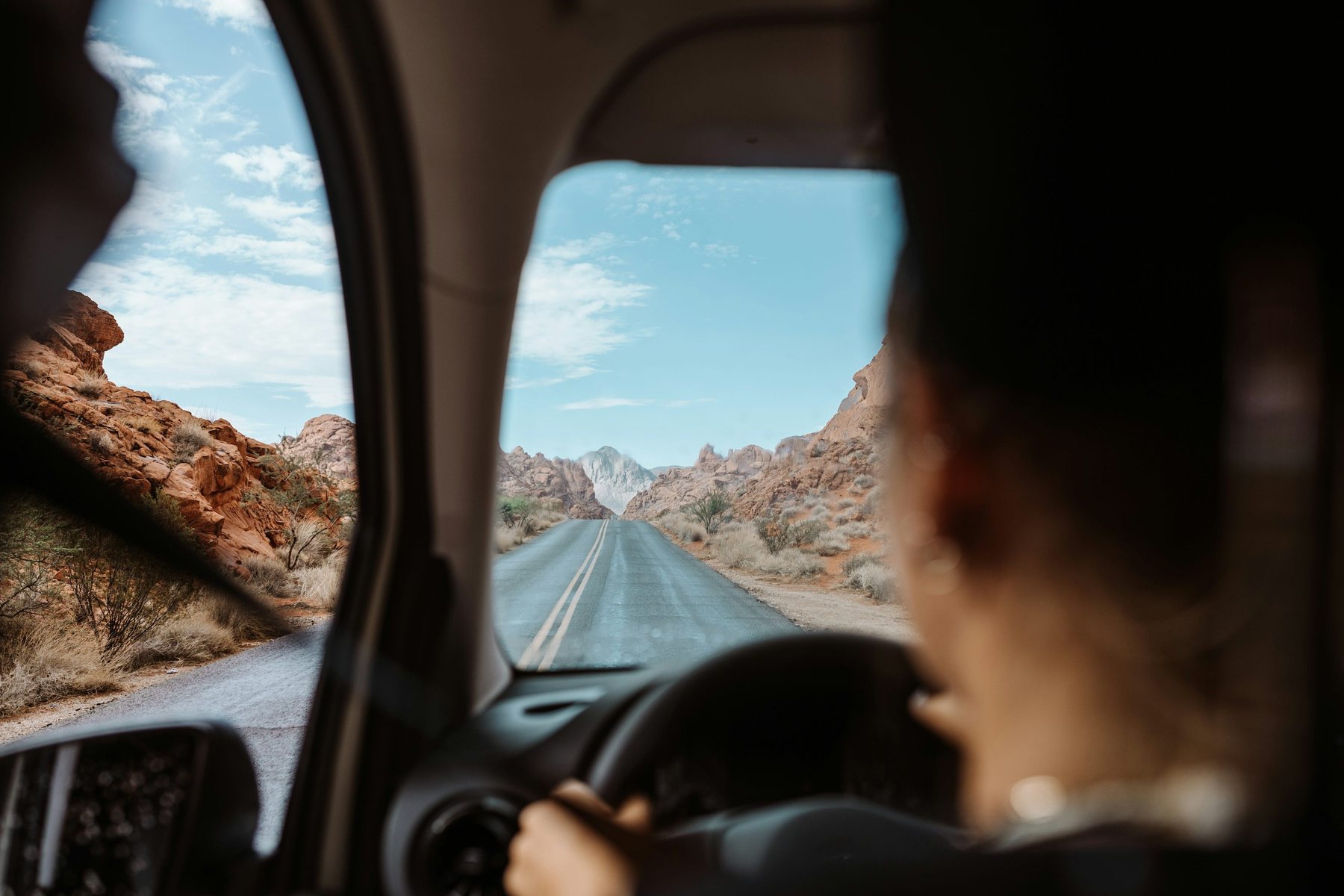 Open-road driving scene in the American Southwest